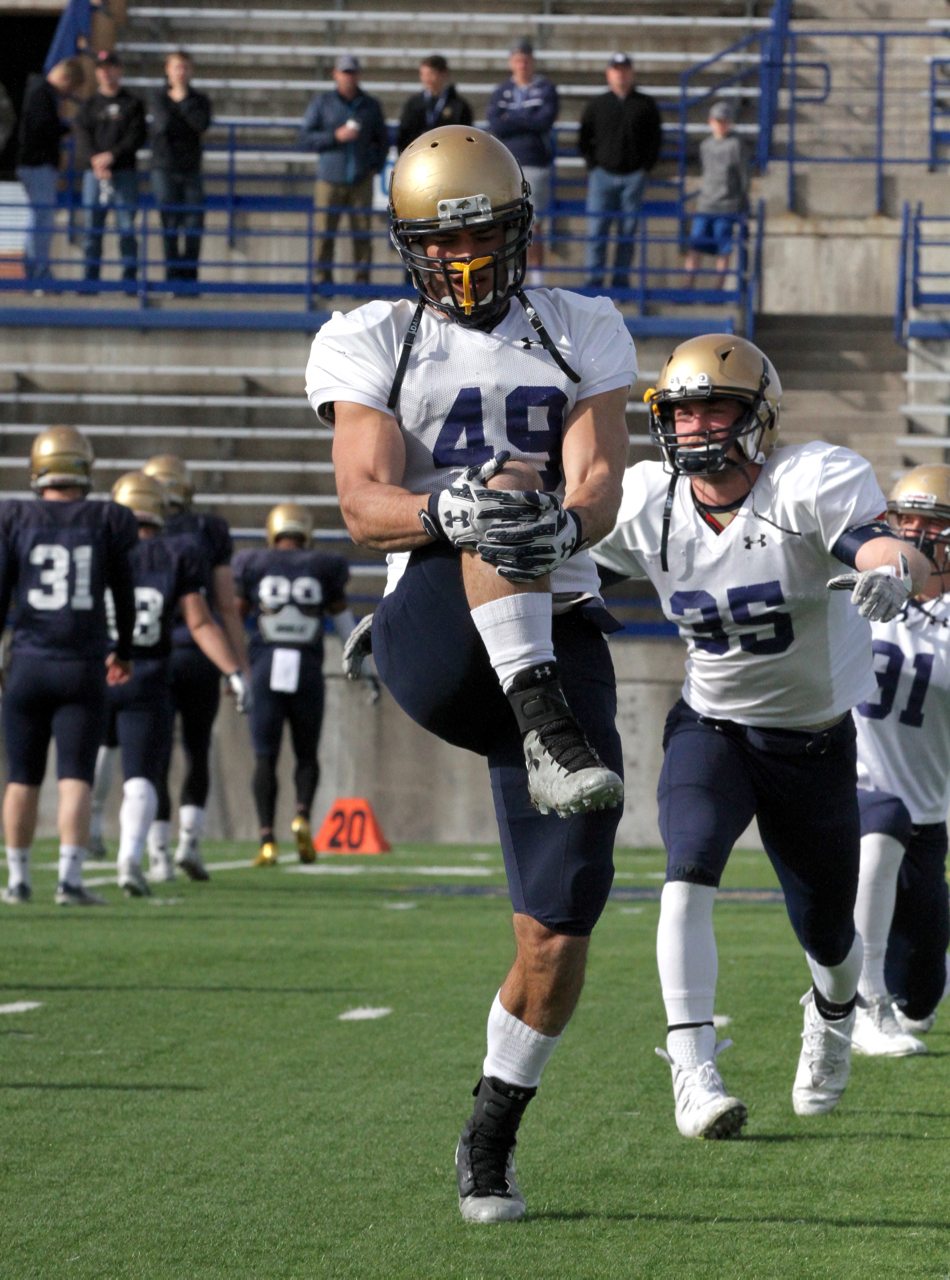 Montana State senior Mac Bignell (49) and freshman Balue Chapman (35)/ by Brooks Nuanez