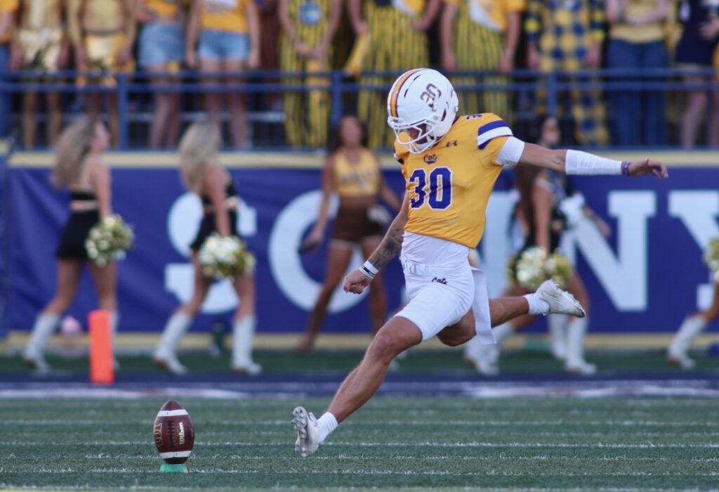 Colby Frokjer blasts a kickoff