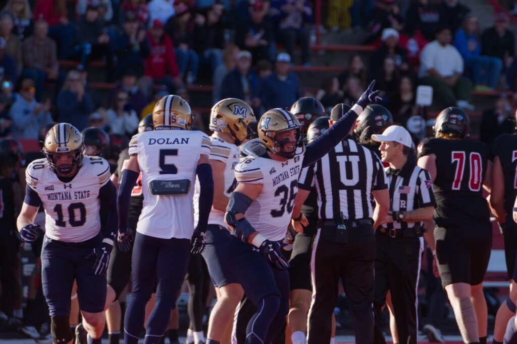 Zac Crews celebrates with Dolan at EWU