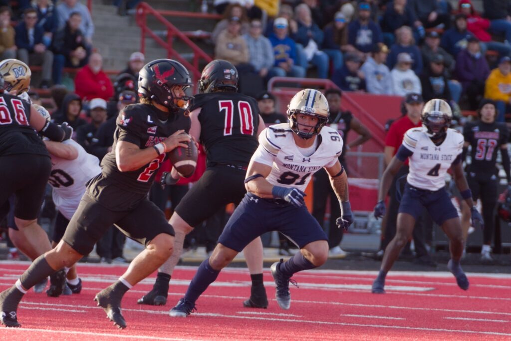 Seth Brock rushes the EWU quarterback