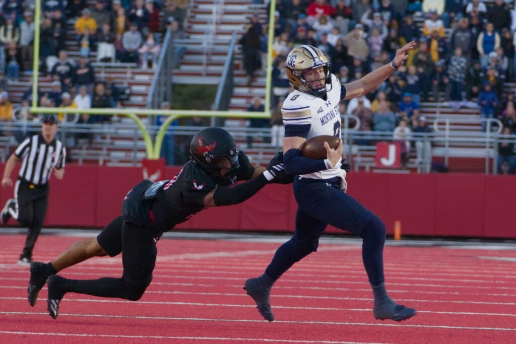 Justin Lamson breaks a tackle at EWU