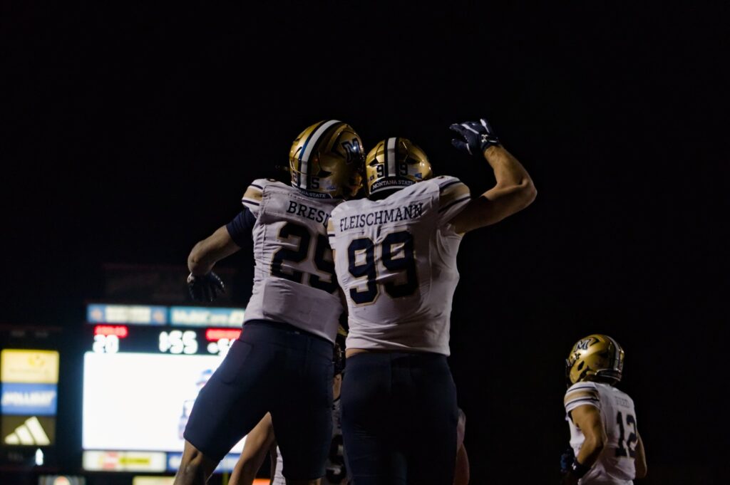 Cale Breslin and Fleischmann celebrate a touchdown