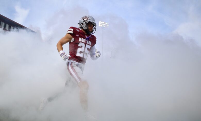 Brady Beaner runs out through the smoke