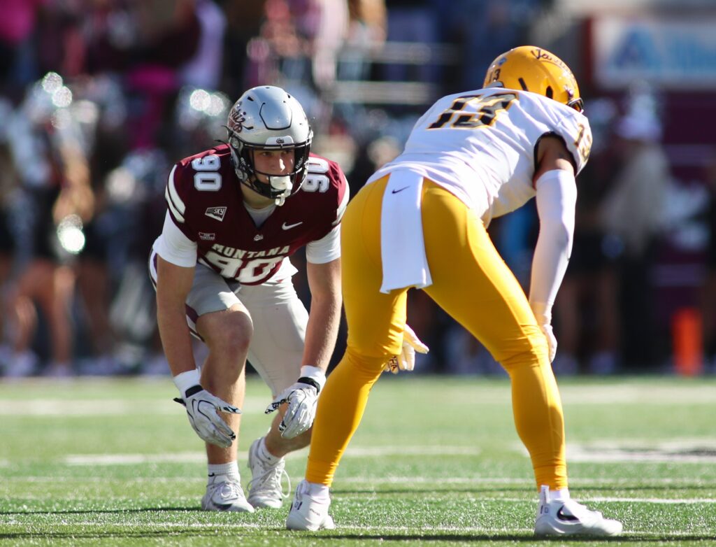 Griz No. 90 lines up across from Vandals