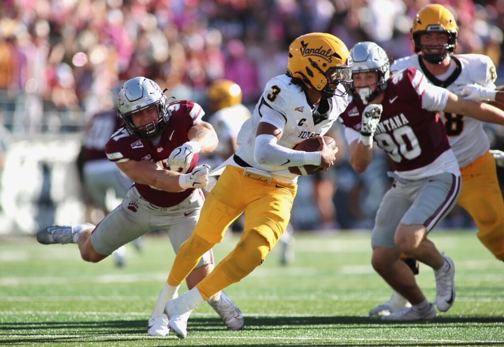 Griz defender dives at Joshua Wood