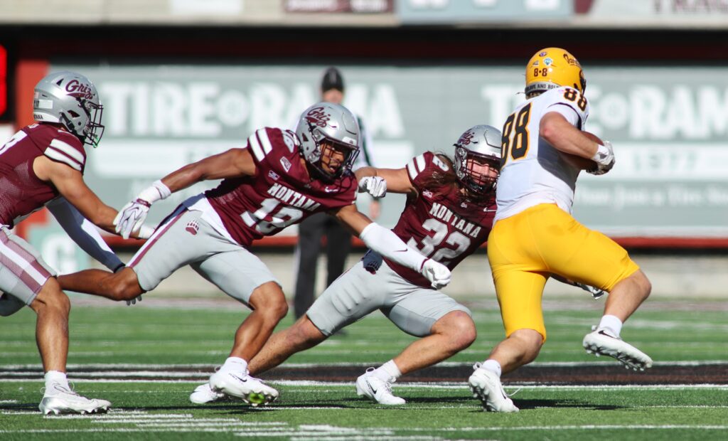 Griz defenders chase Gus Donnerberg
