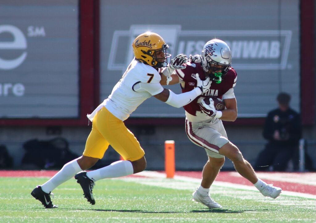 Griz receiver fights through Vandals defender
