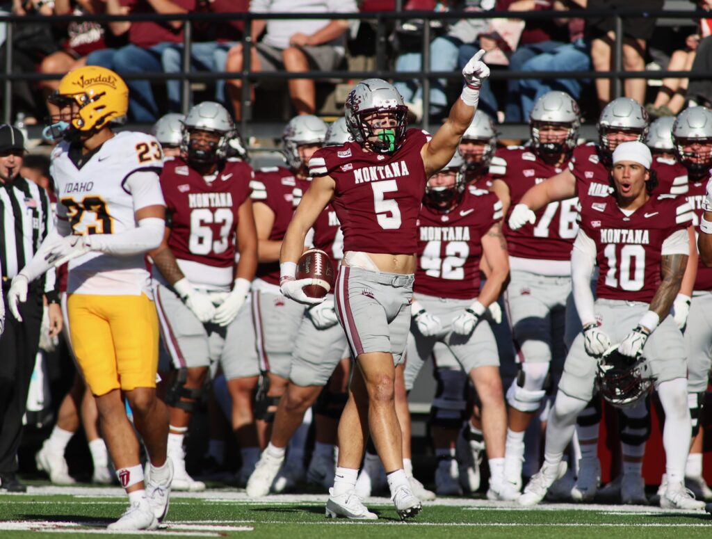 Ian Finch celebrates on the Griz sideline