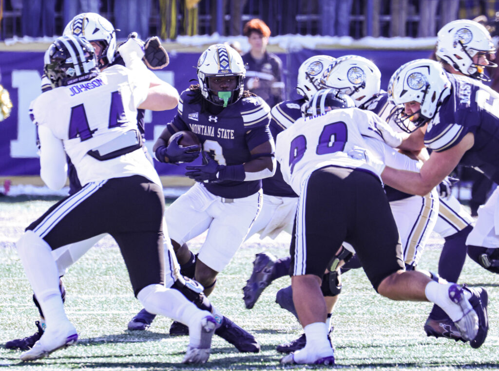 Jared White runs through traffic