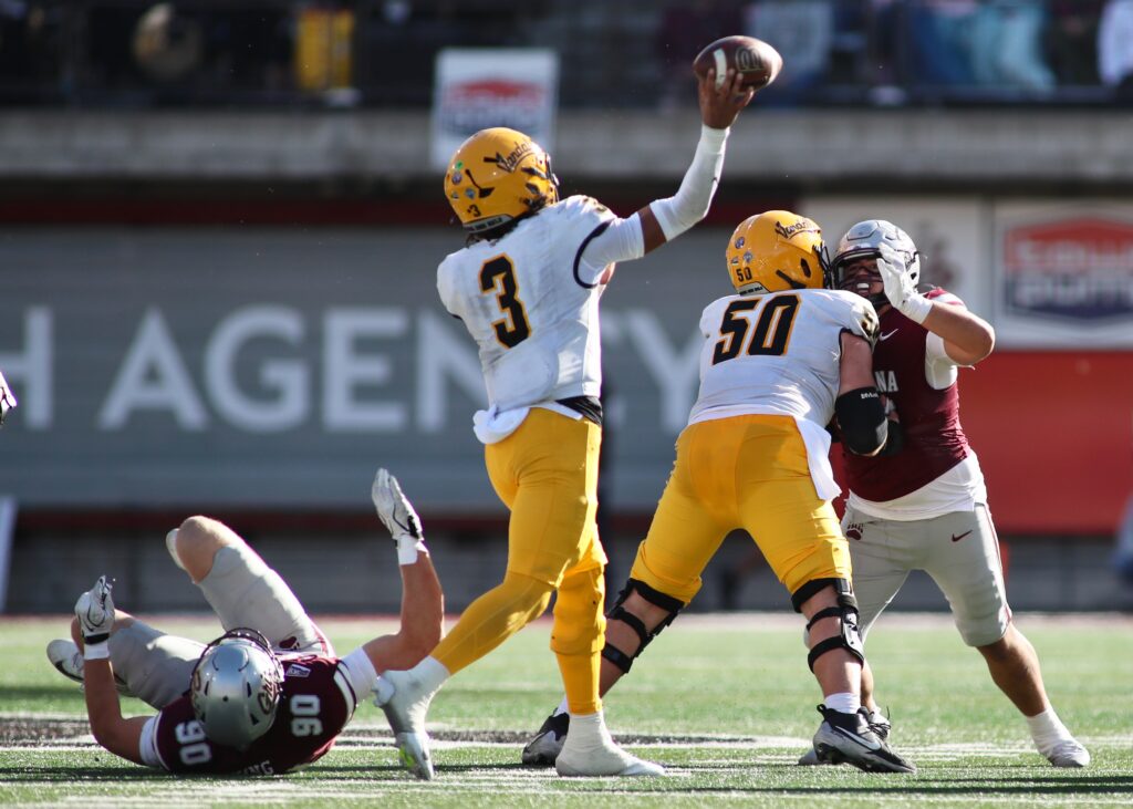 Joshua Wood throws as Griz No. 90 falls