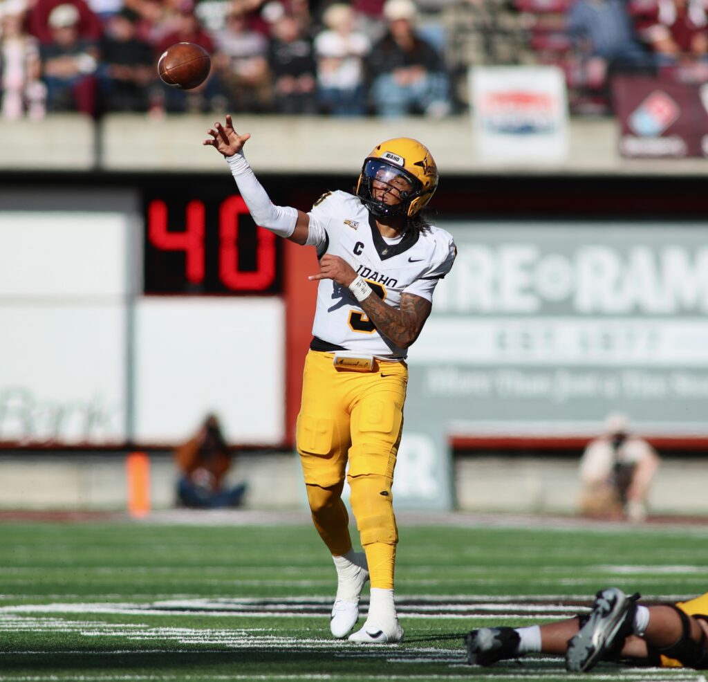 Joshua Wood throws on the move