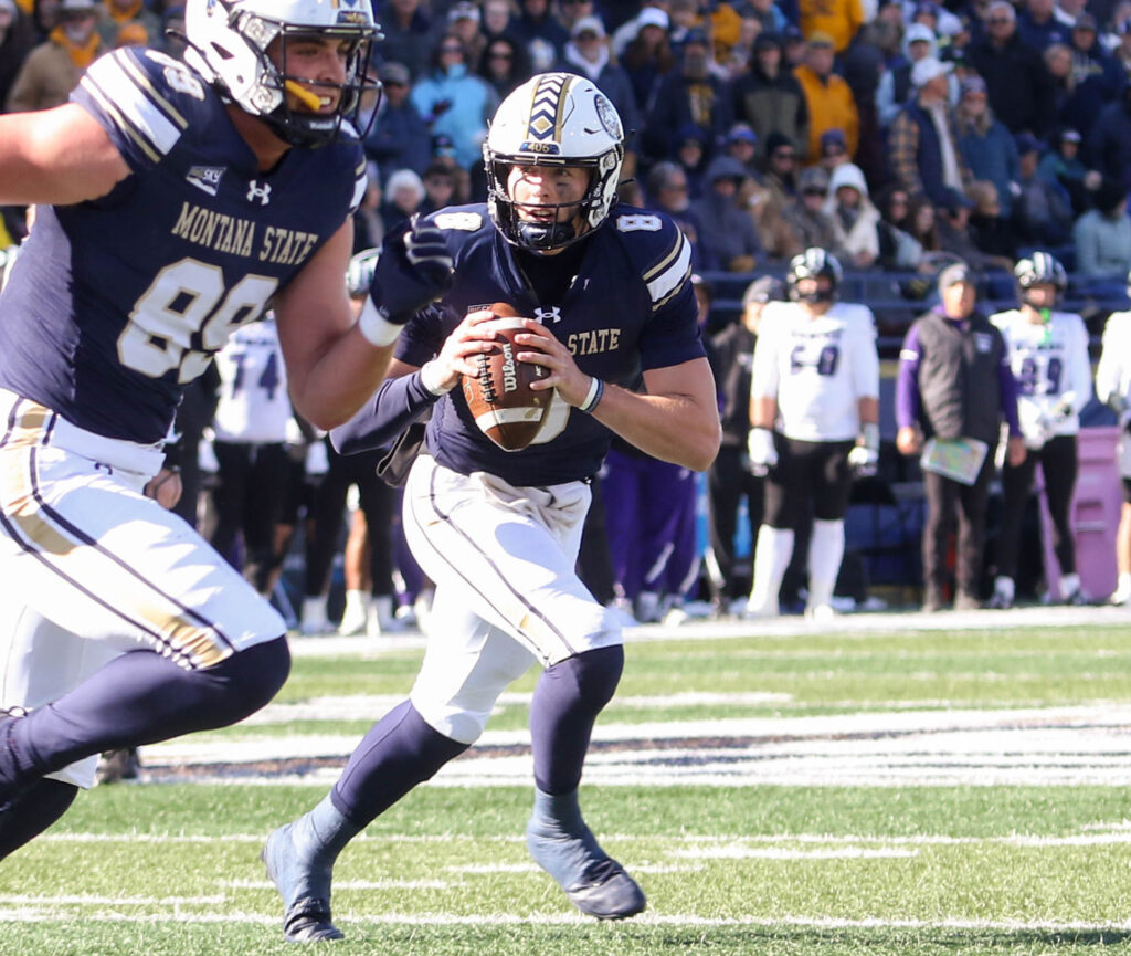 Justin Lamson drops back to pass