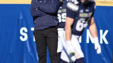 Brent Vigen watches from the sideline