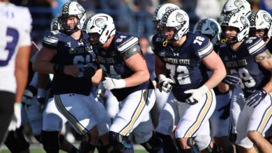 The Bobcat offensive line breaks the huddle