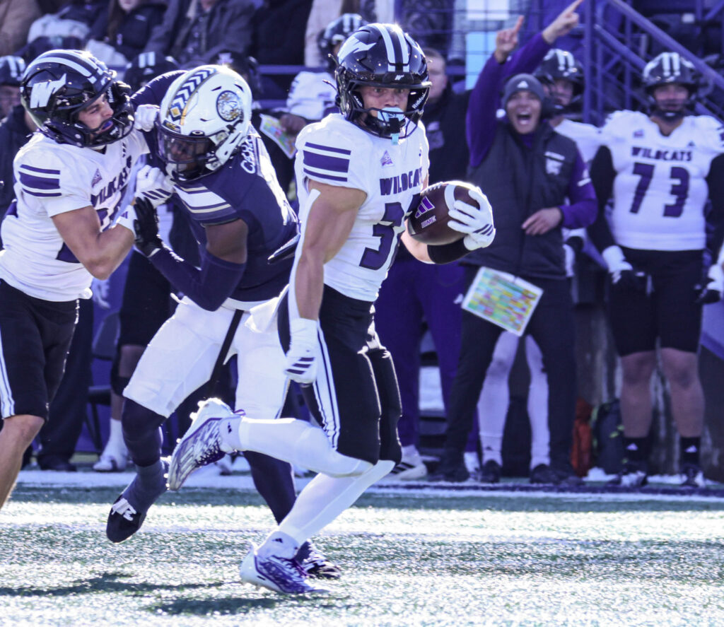 Seth Rigtrup runs after the catch