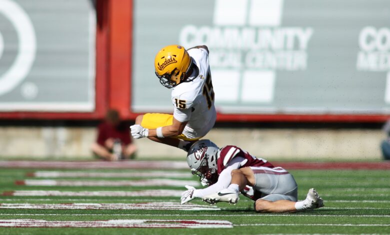 Superales leaps over Griz tackler