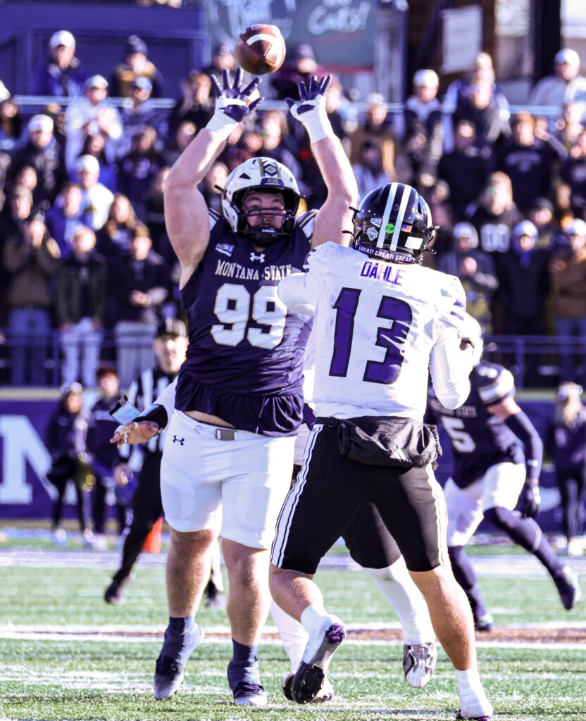Talon Marsh gets a hand up against Nate Dahle