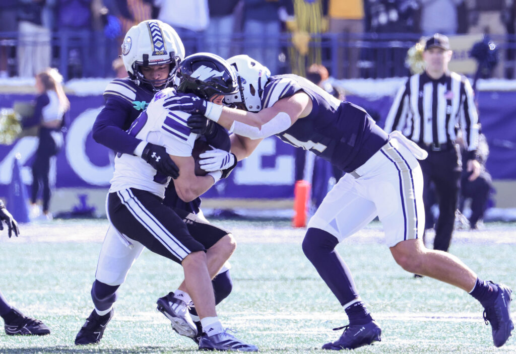 Tayden Gray and Cole Taylor combine on a tackle
