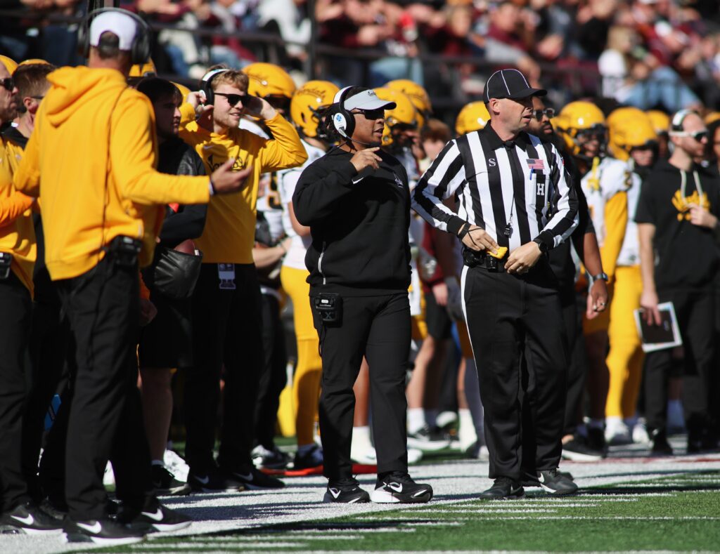 Thomas Ford Jr. coaches from the Vandals sideline