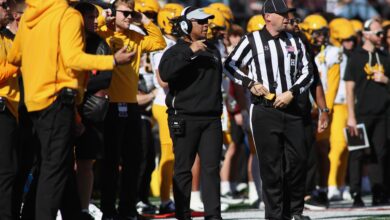 Thomas Ford Jr. coaches from the Vandals sideline