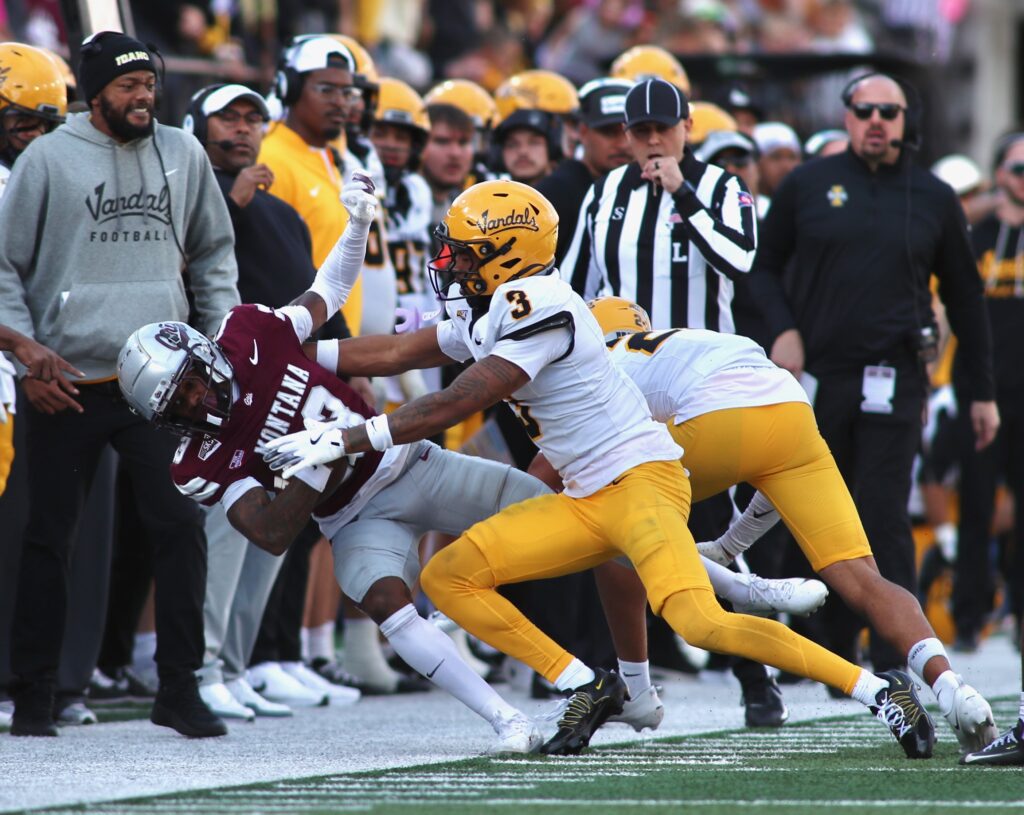 Vandals defender shoves Griz player out of bounds