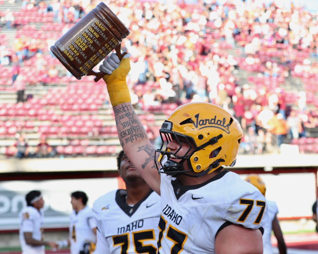 Vandals lineman hoists the Little Brown Stein