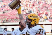Kaden Haeckel hoists the Little Brown Stein