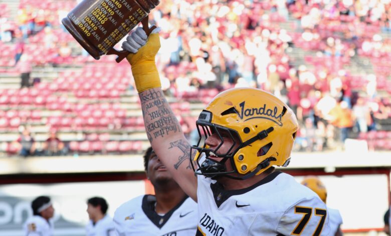 Vandals lineman hoists the Little Brown Stein