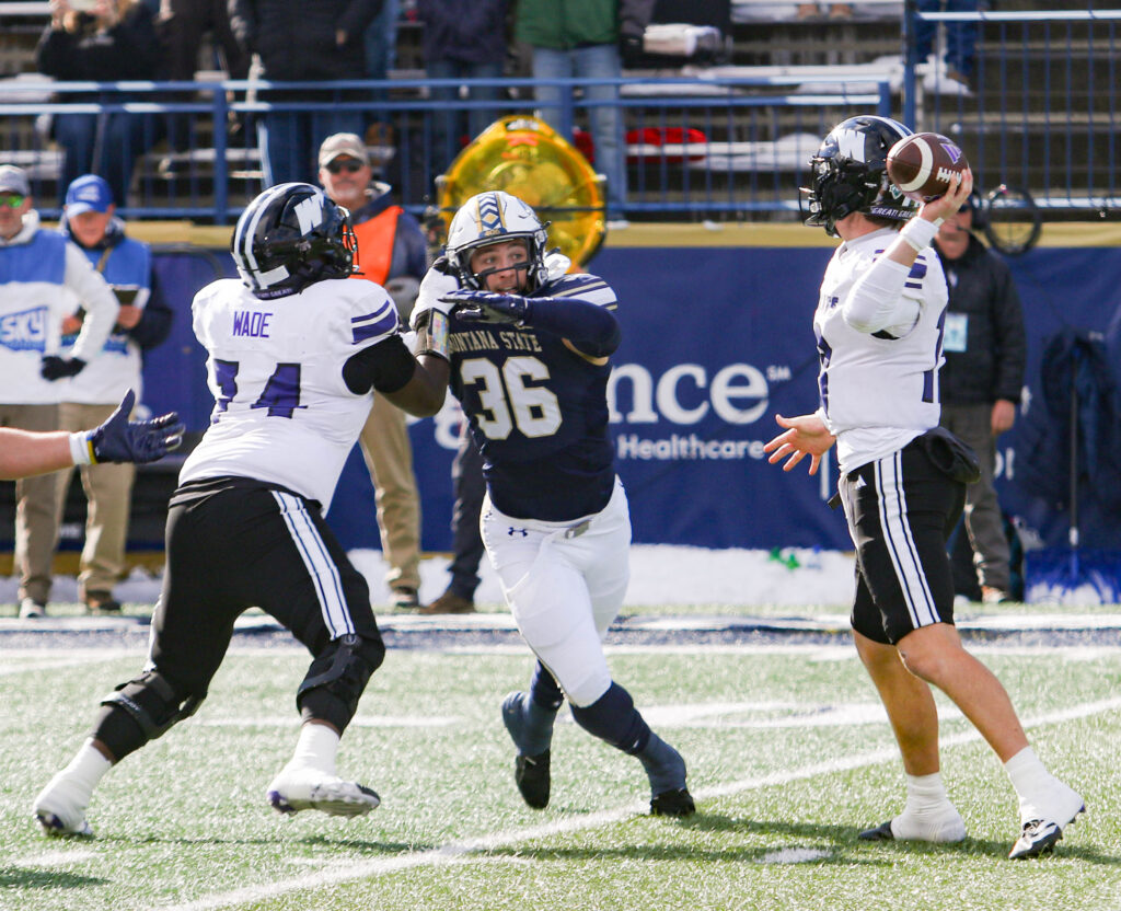 Zac Crews pressures the quarterback