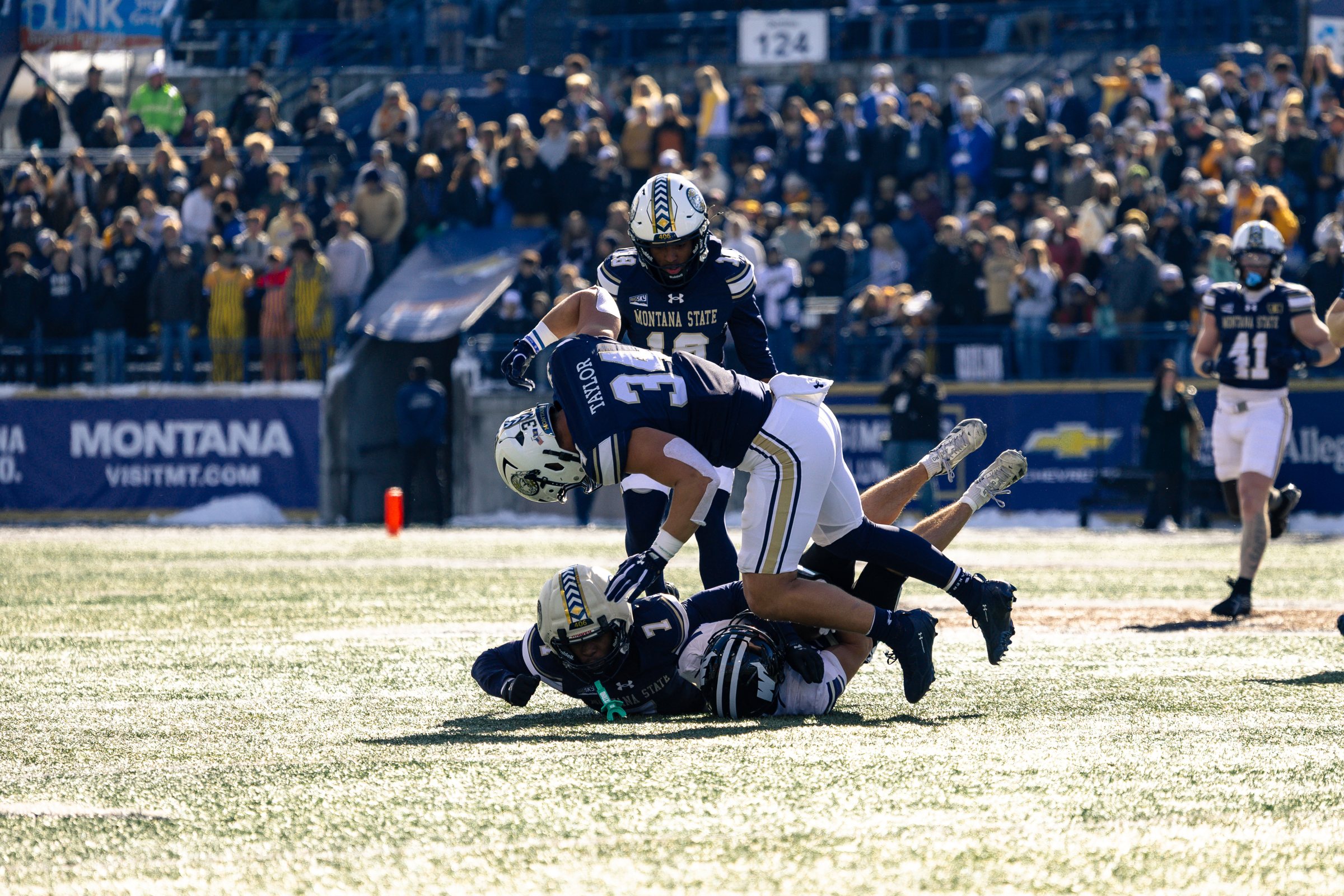 Cole Taylor brings down a Wildcat ballcarrier