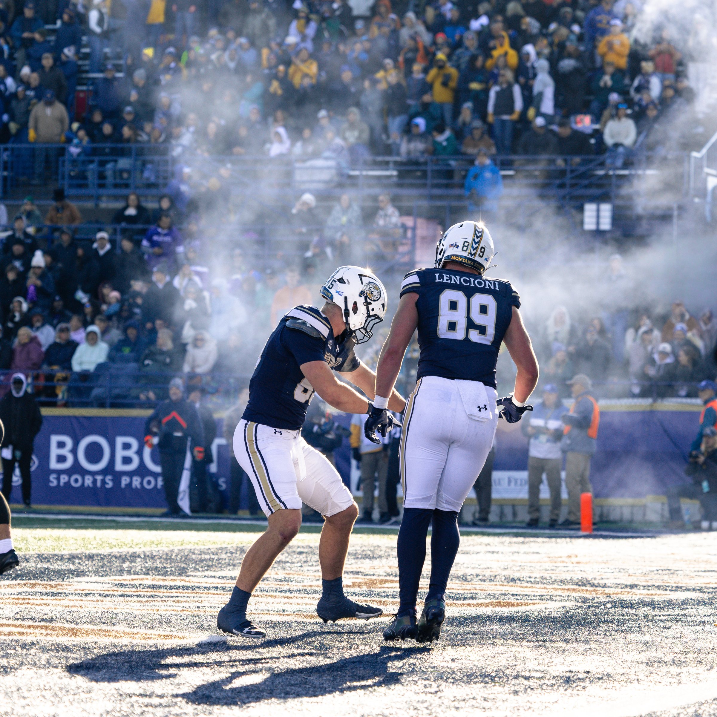 Rocky Lencioni celebrates with a teammate in the steam