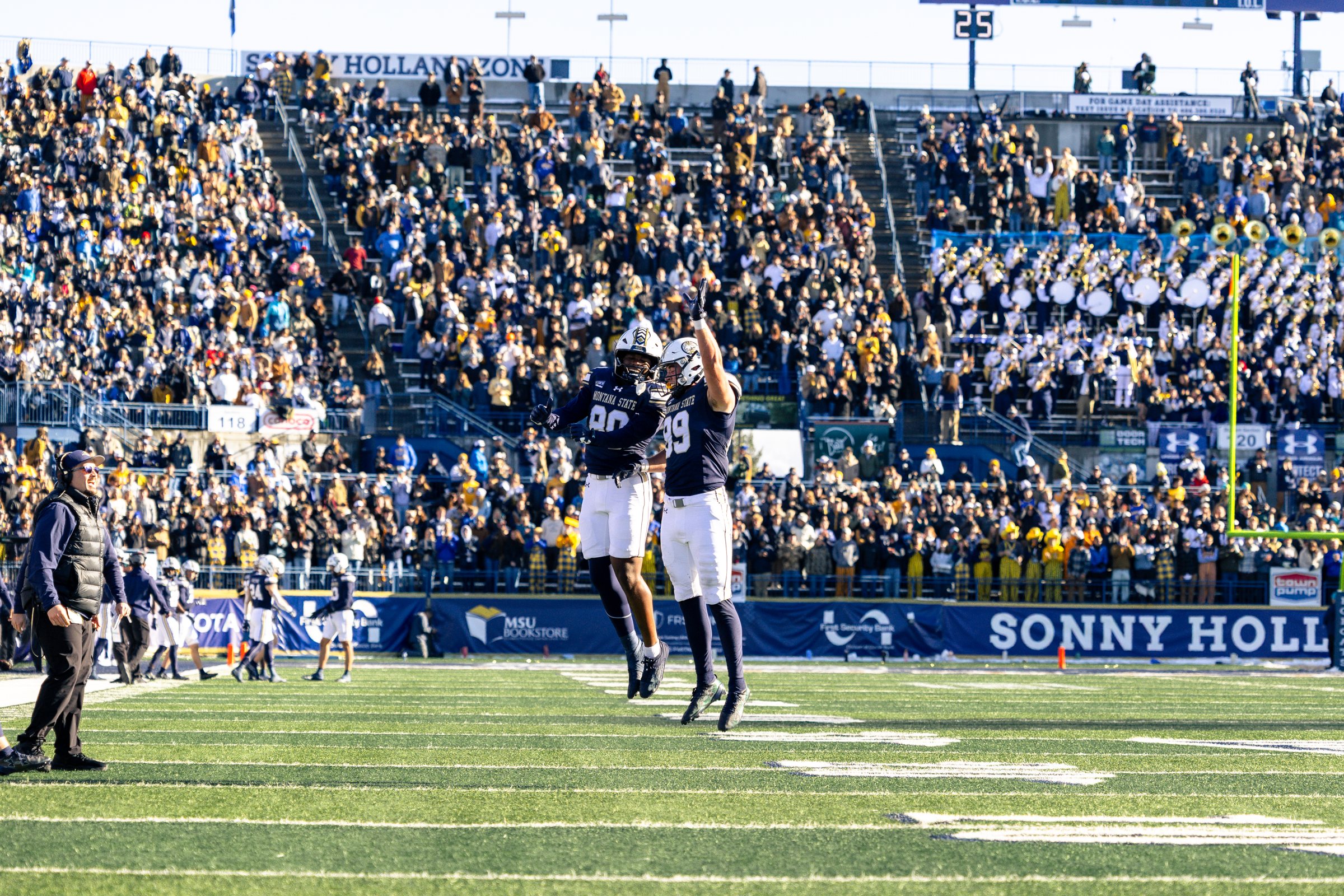 Luvens Valcin and Rocky Lencioni leap to celebrate