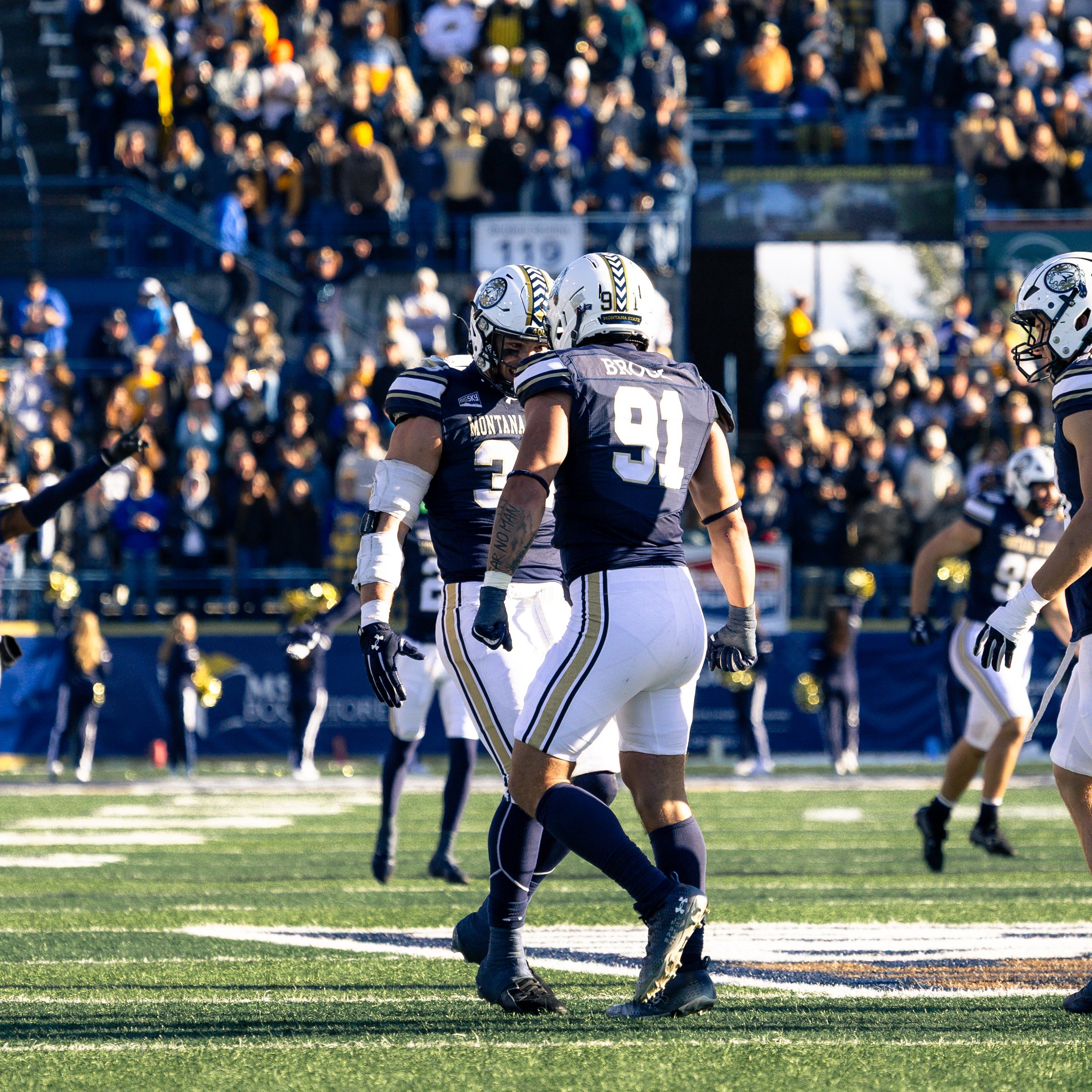 Seth Brock heads back to the huddle