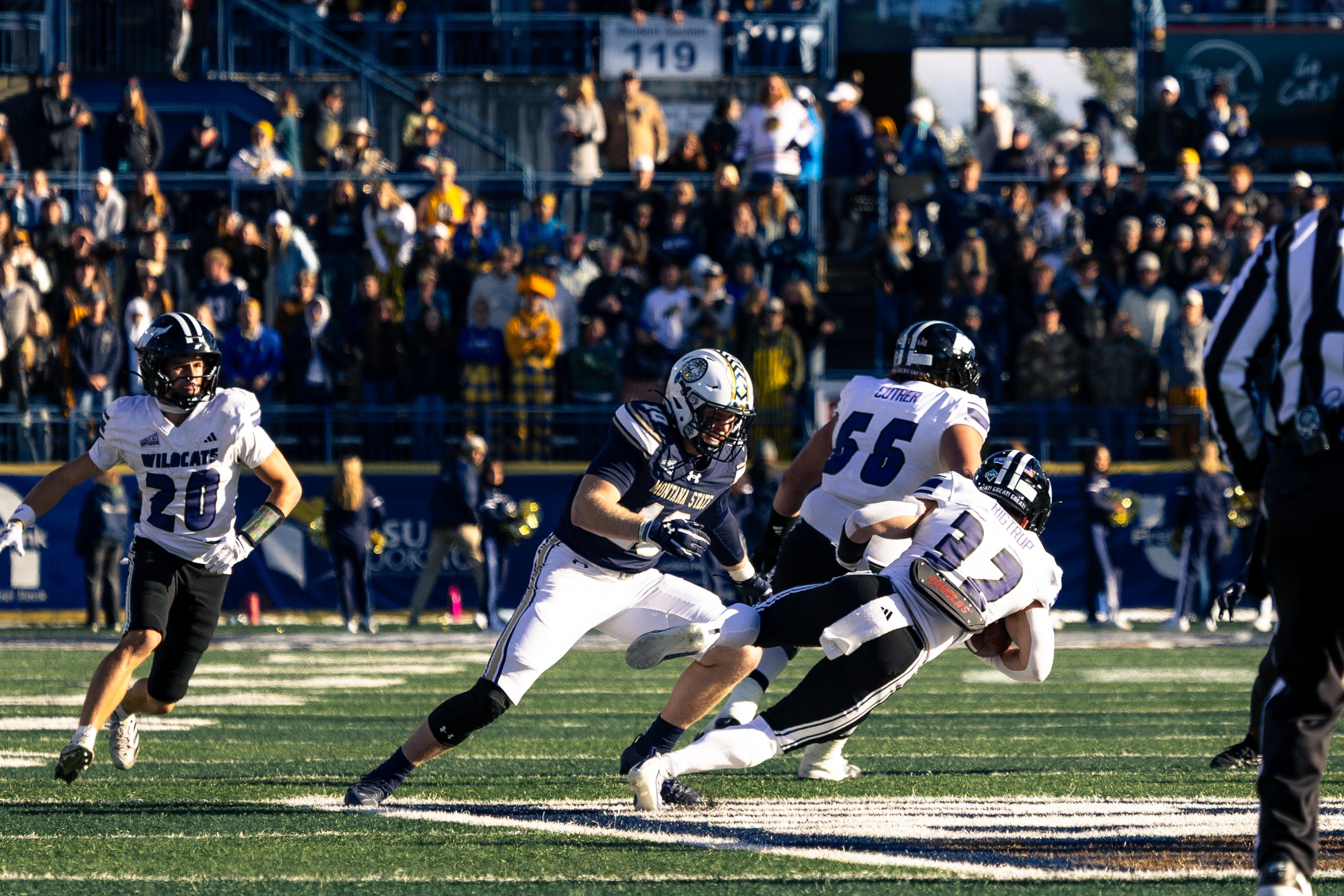 The Bobcat defense brings down a Wildcat ballcarrier