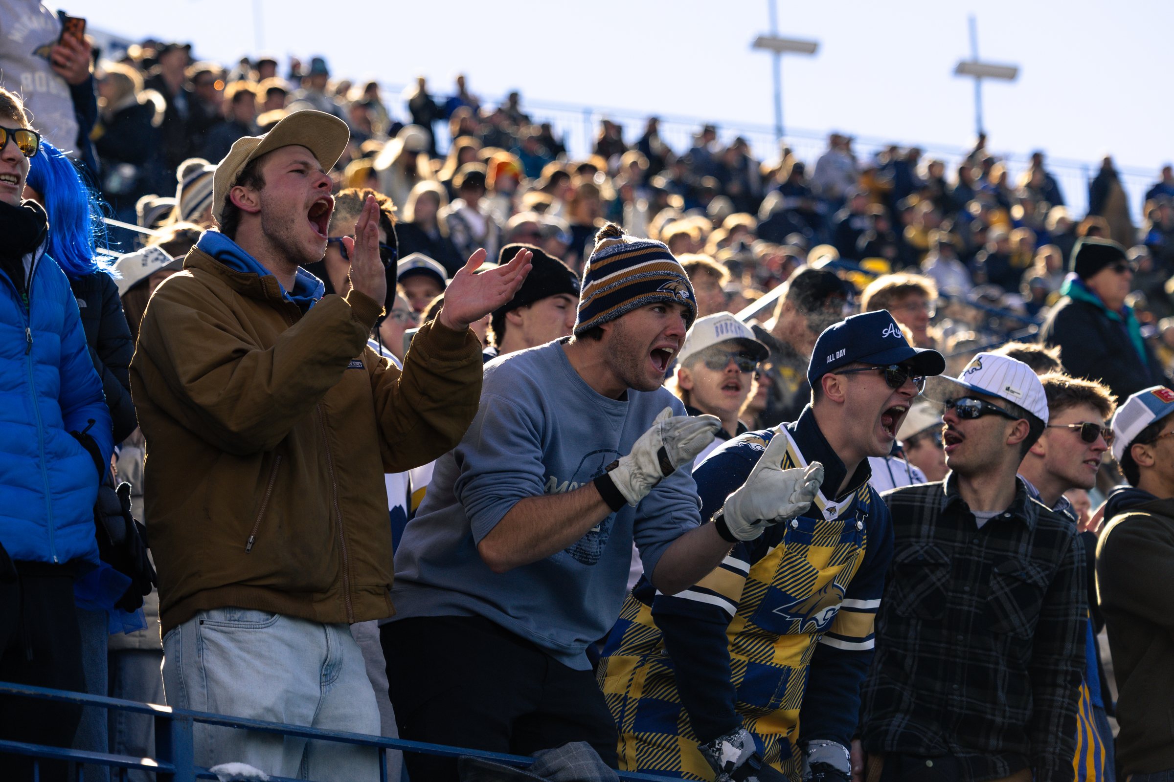 Bobcat students cheer from the student section
