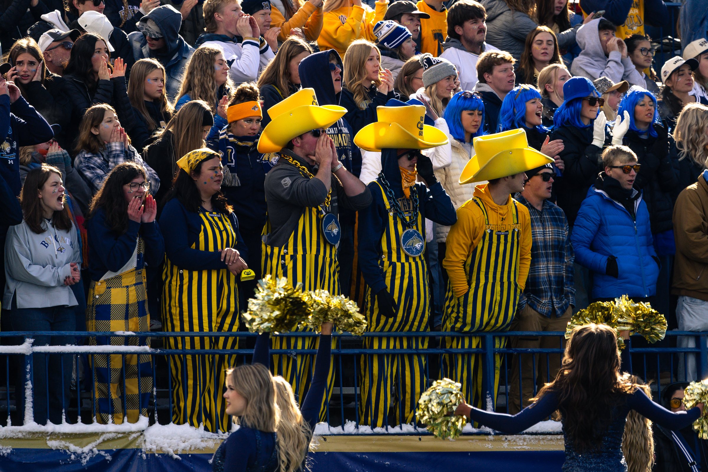 Bobcat cheerleaders rally the student section